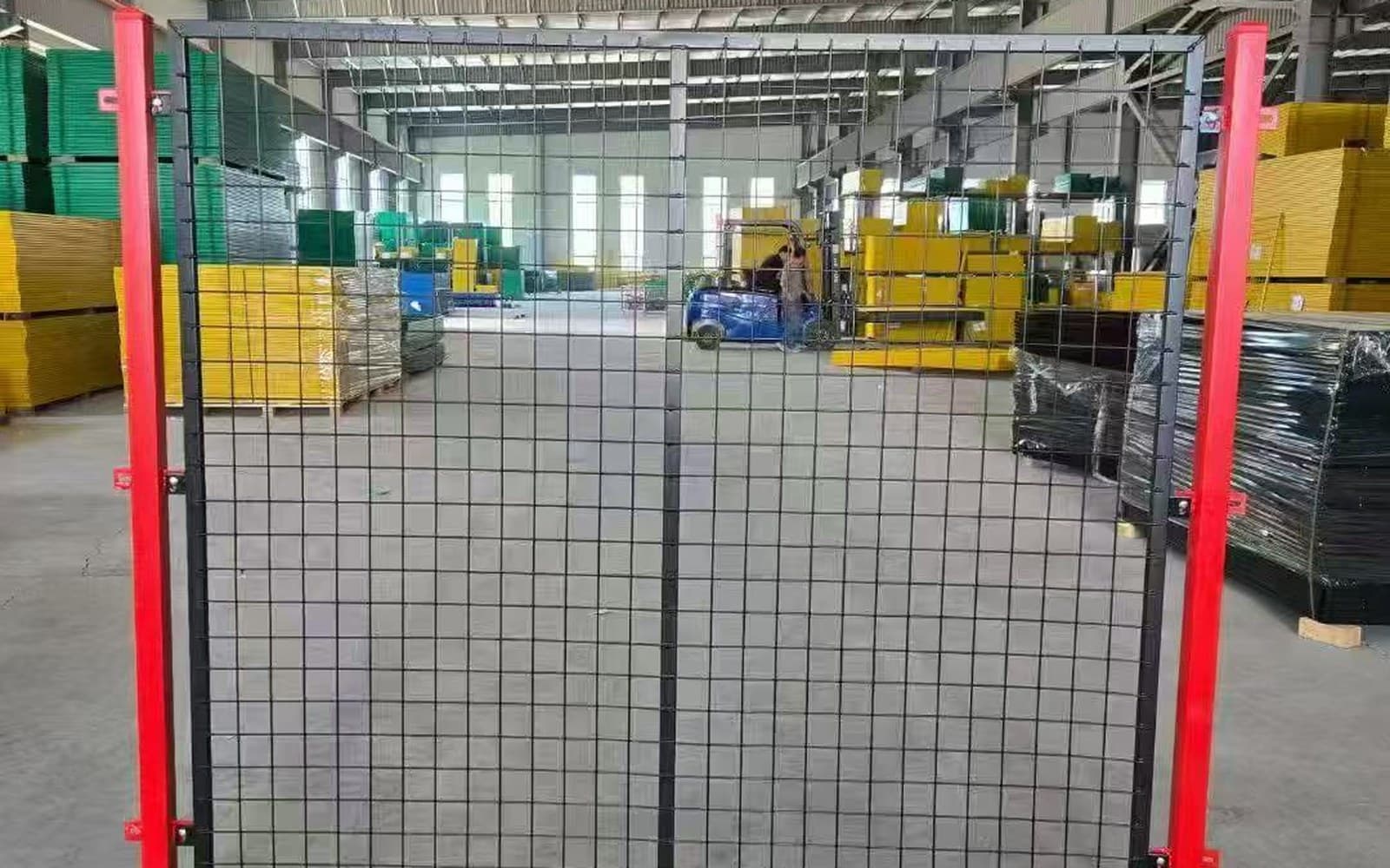 Industrial mesh enclosure in a factory