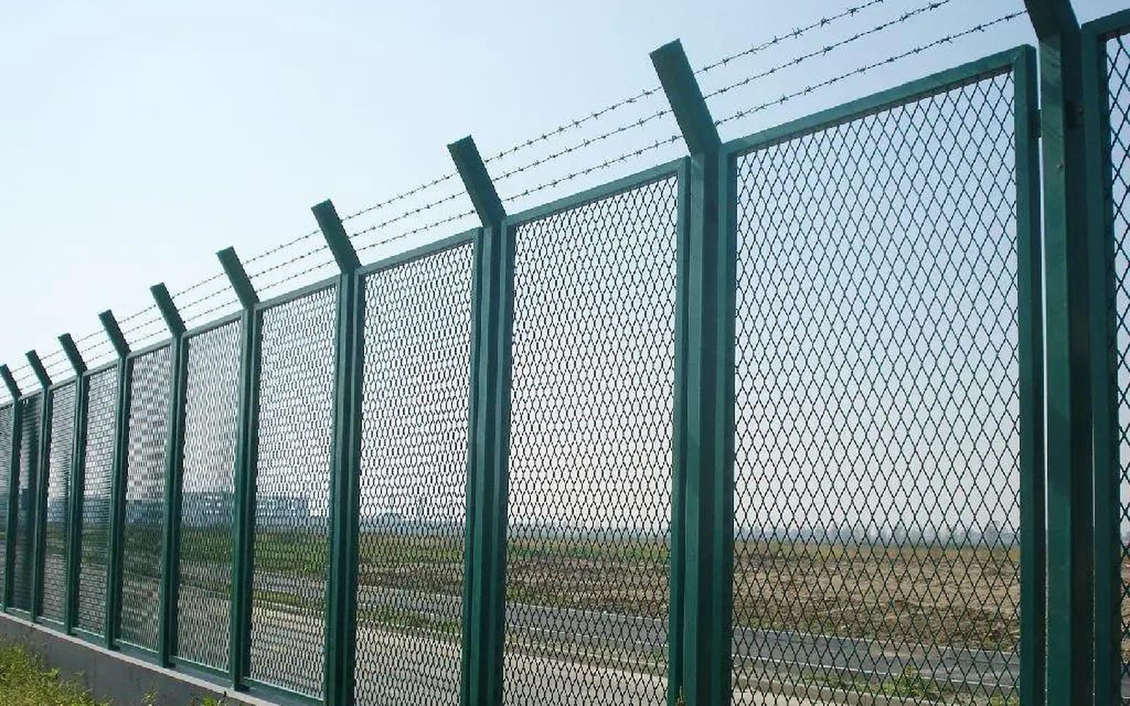 Perimeter fence components aligned for site delivery