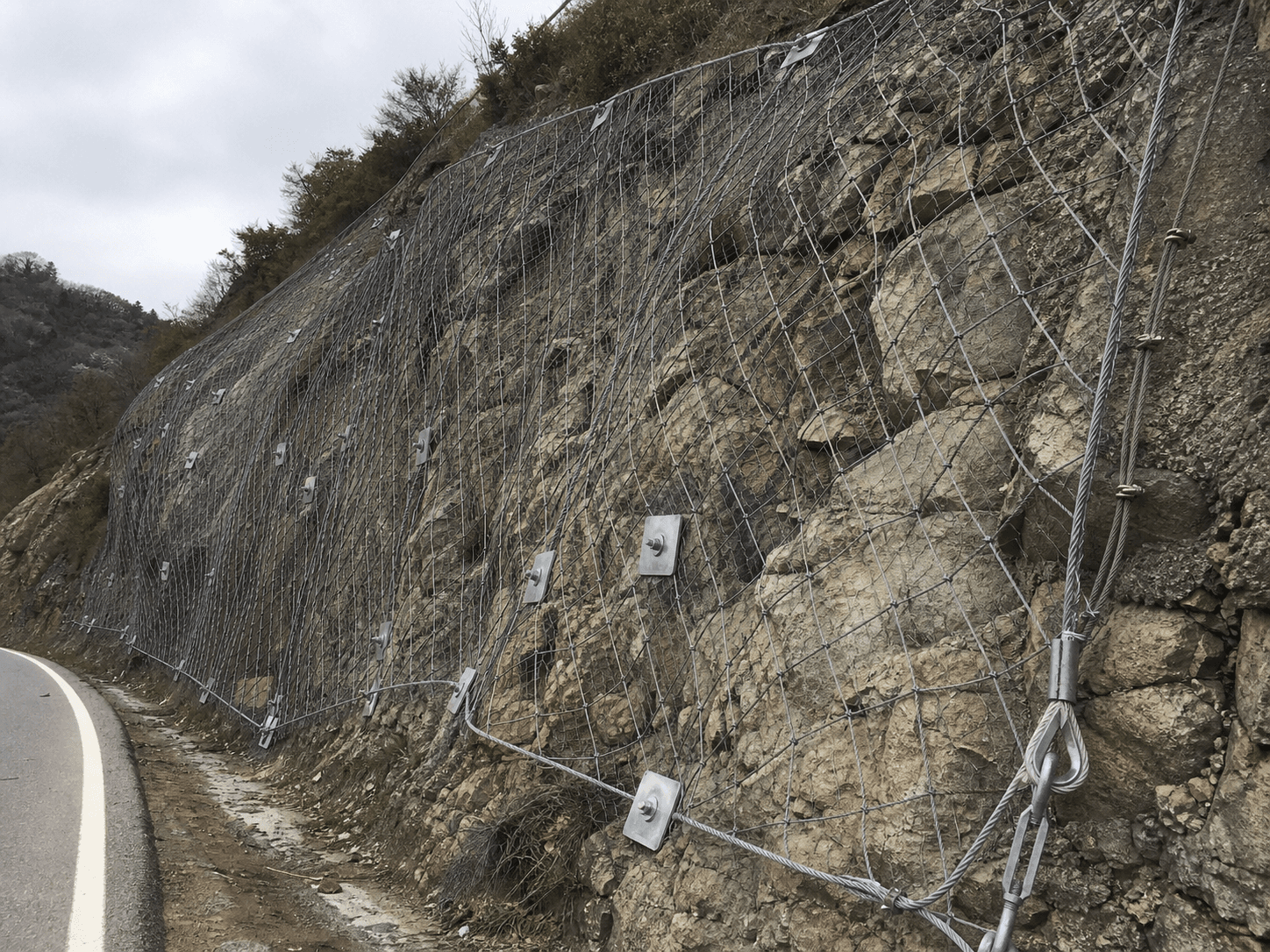 Active Slope Protection Mesh System in a realistic industrial setting