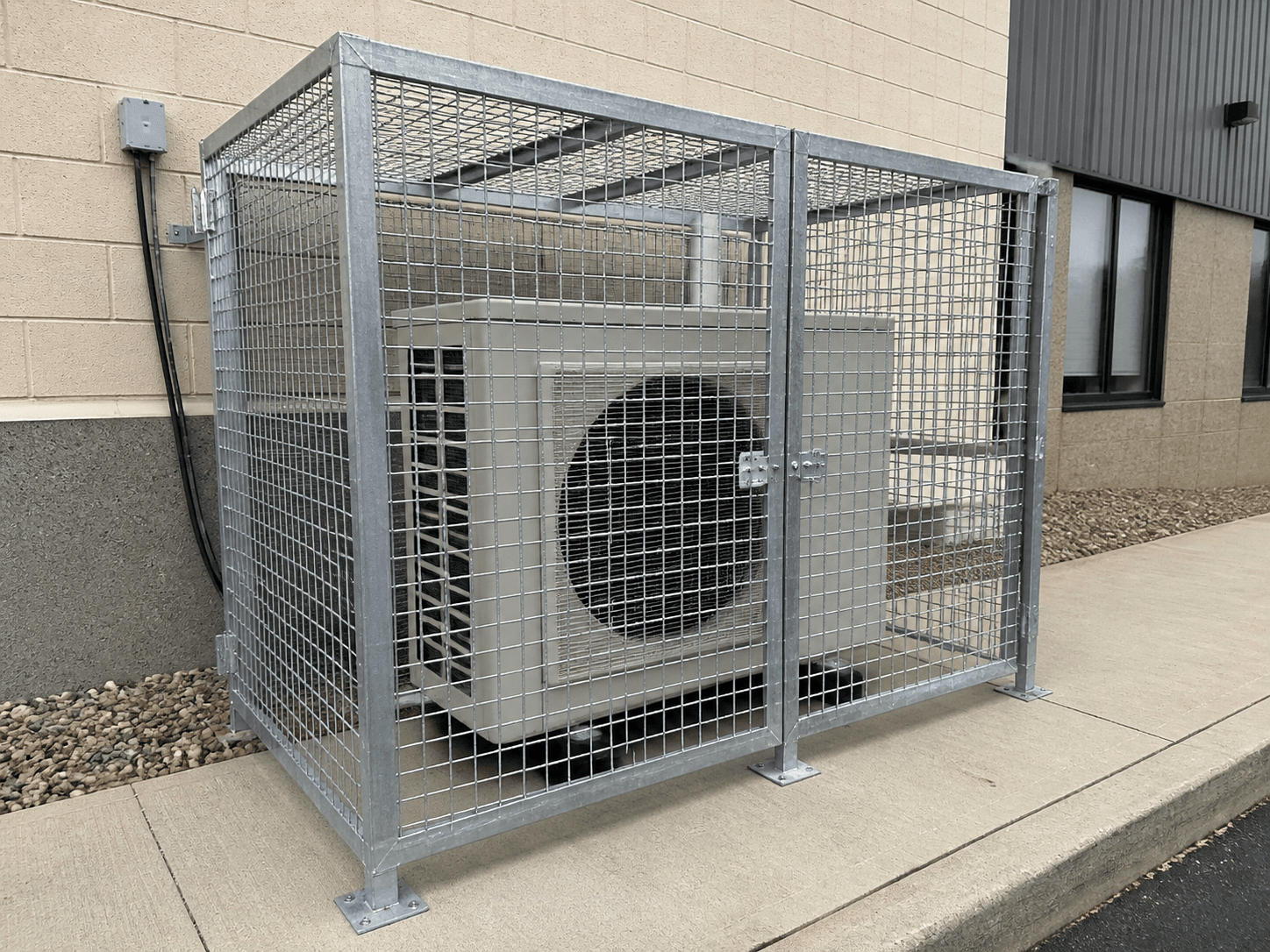 Outdoor AC Unit Security Enclosure in a realistic industrial setting