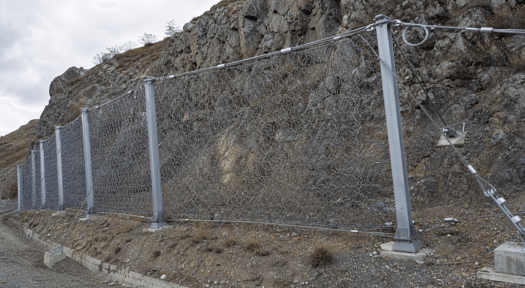Passive Rockfall Barrier System in a realistic industrial setting