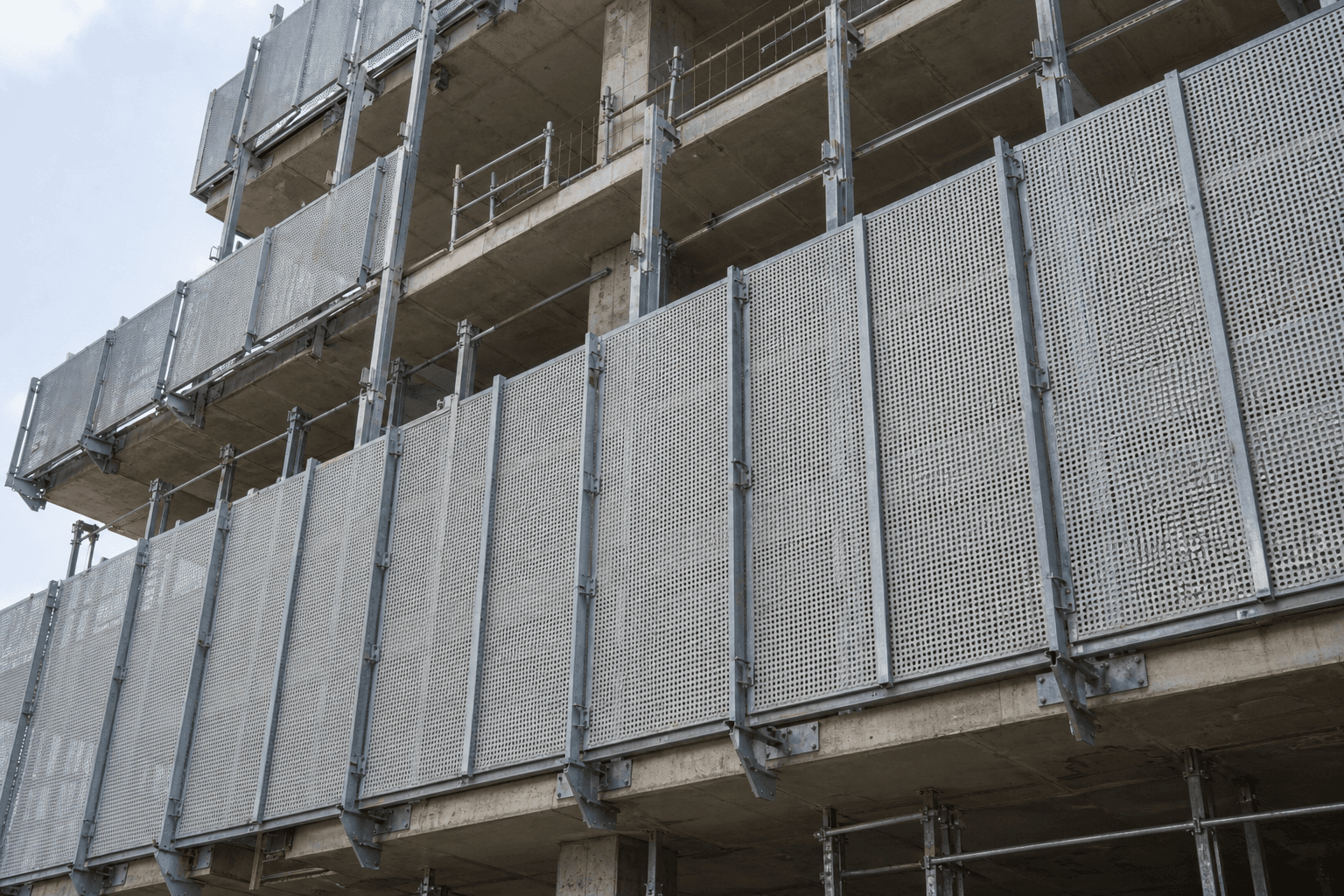 Perforated Climbing-Scaffold Safety Screen in a realistic industrial setting