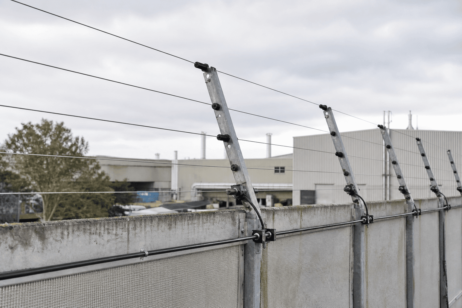 Pulsed Electric Security Fence in a realistic industrial setting